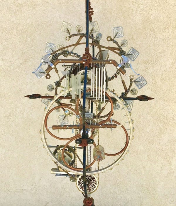 Orginal Steampunk sculpture of a wind and sound wheel